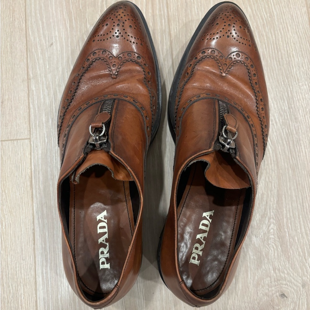 Prada Runway Lug-Sole Zip Wing-Tip, Brown.
Size Used like new 
13